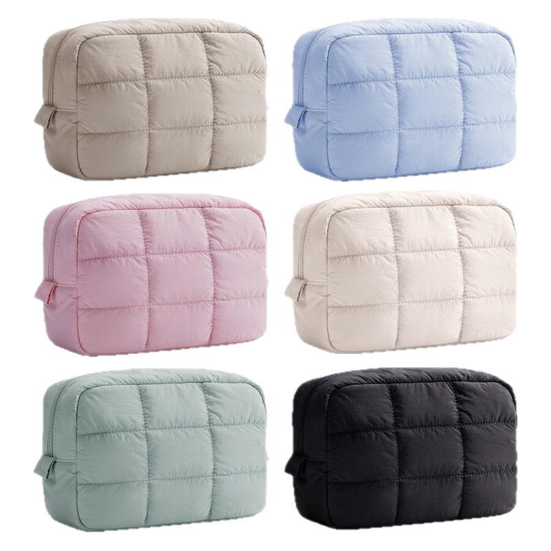 Quilted puffy makeup pouches in soft colors
