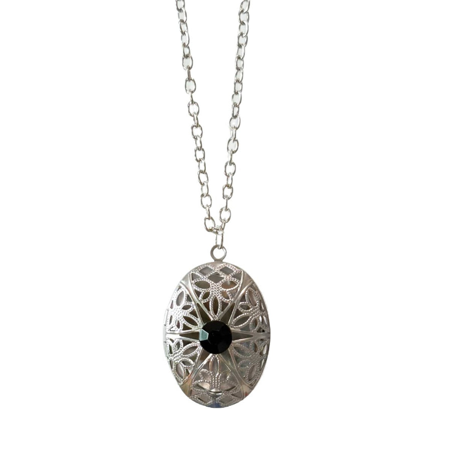Filigree locket with black crystal